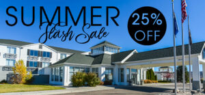 Summer flash sale banner over apartment complex entrance